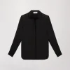 Chemise en soie à pois noire