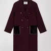 Manteau mi-long poches en fourrure muscat