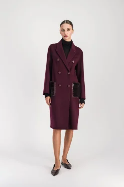 Manteau mi-long poches en fourrure muscat