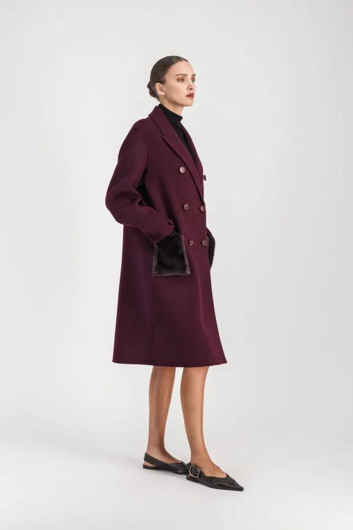 Manteau mi-long poches en fourrure muscat