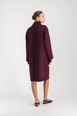 Manteau mi-long poches en fourrure muscat