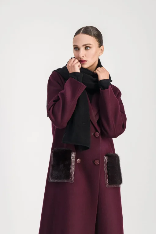 Manteau mi-long poches en fourrure muscat