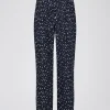 Pantalon fluide en soie marine imprimé pois