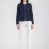 Veste courte en tweed marine avec détails frangés