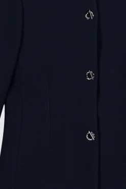 Veste marine avec boutons oeillet
