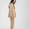 Veste saharienne en soie beige