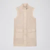 Veste sans manche en daim perforé beige clair